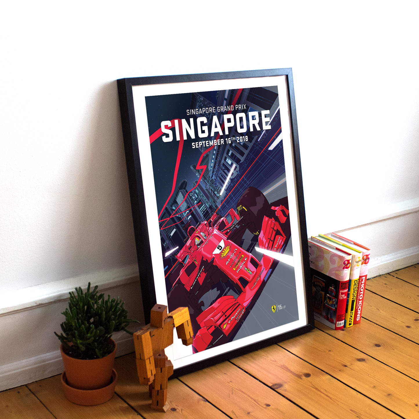 a picture of a movie poster next to a potted plant